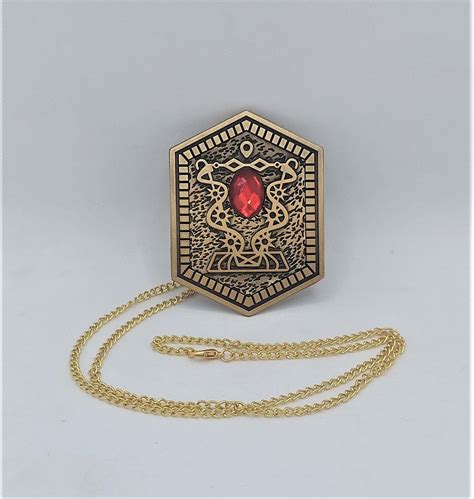 Heart shaped damballa amulet